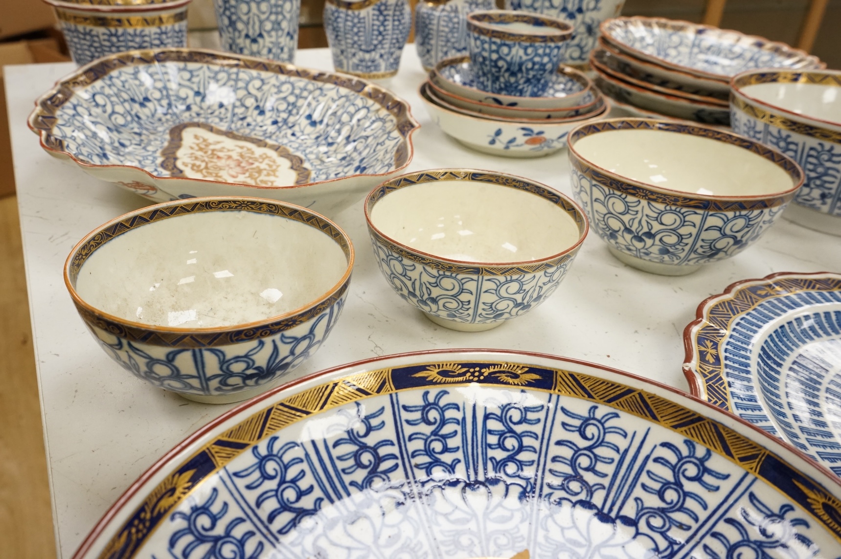 A collection of Worcester Royal Lily pattern tea, coffee and dessert wares and two similar dishes, late 18th/early 19th century